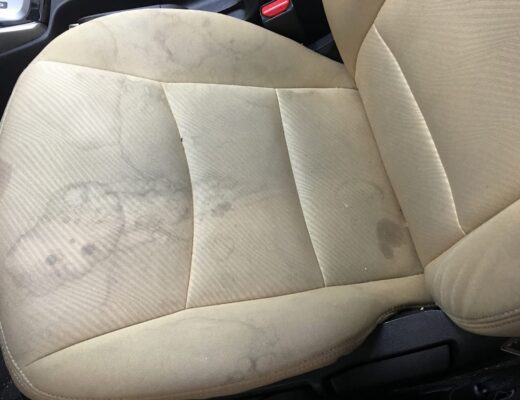 stains on the fabric upholstery of a car seat